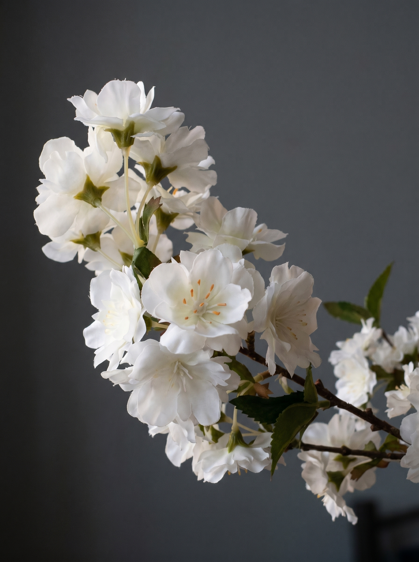 Silk flower arrangement styled in modern living room